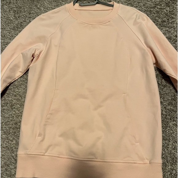 Lululemon light pink / peach sweatshirt. Very comfortable! No stains - Picture 1 of 4